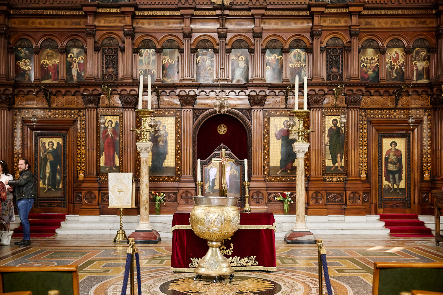 An inside view of a greek orthodox church.