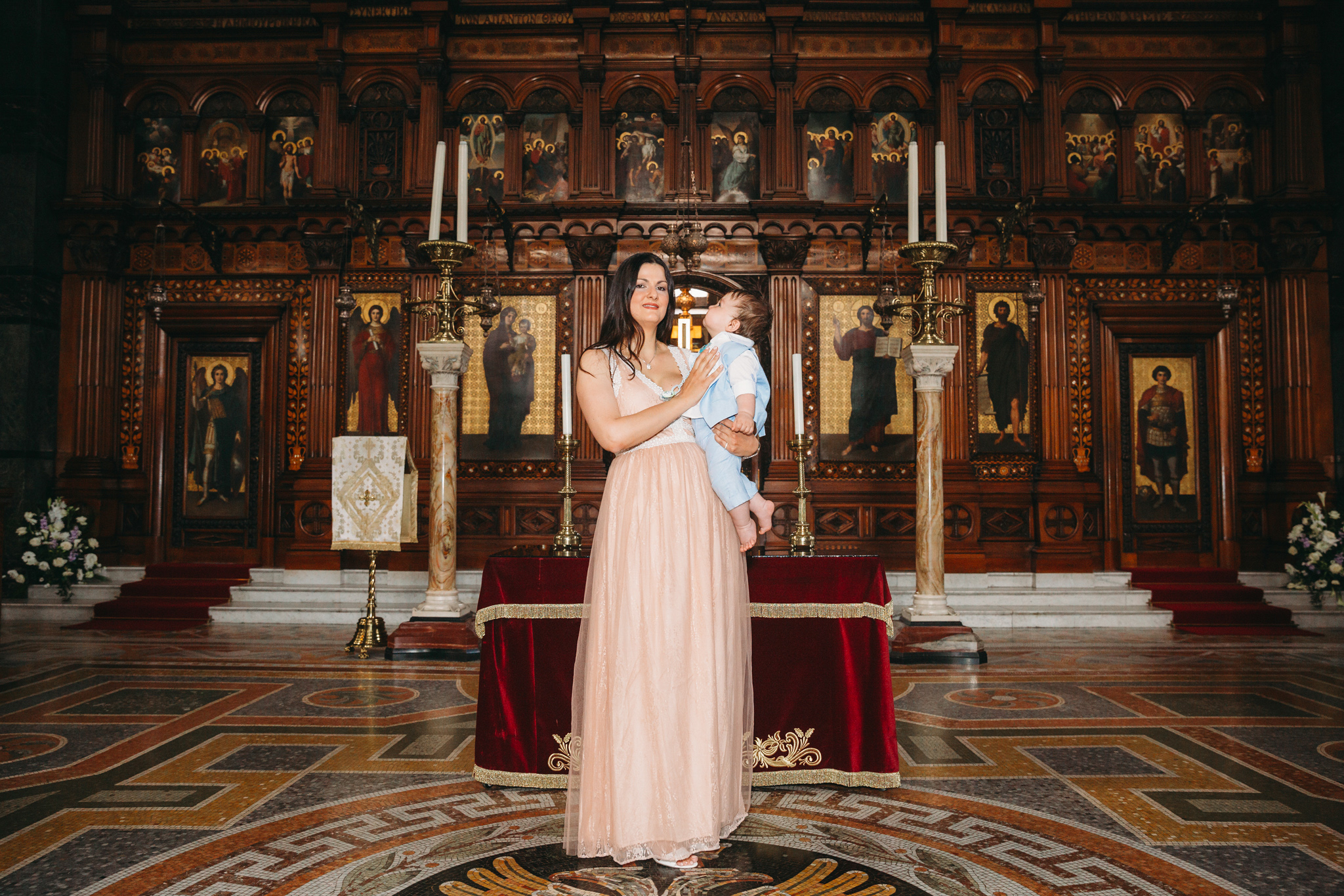 Mum with her baby after his christening.