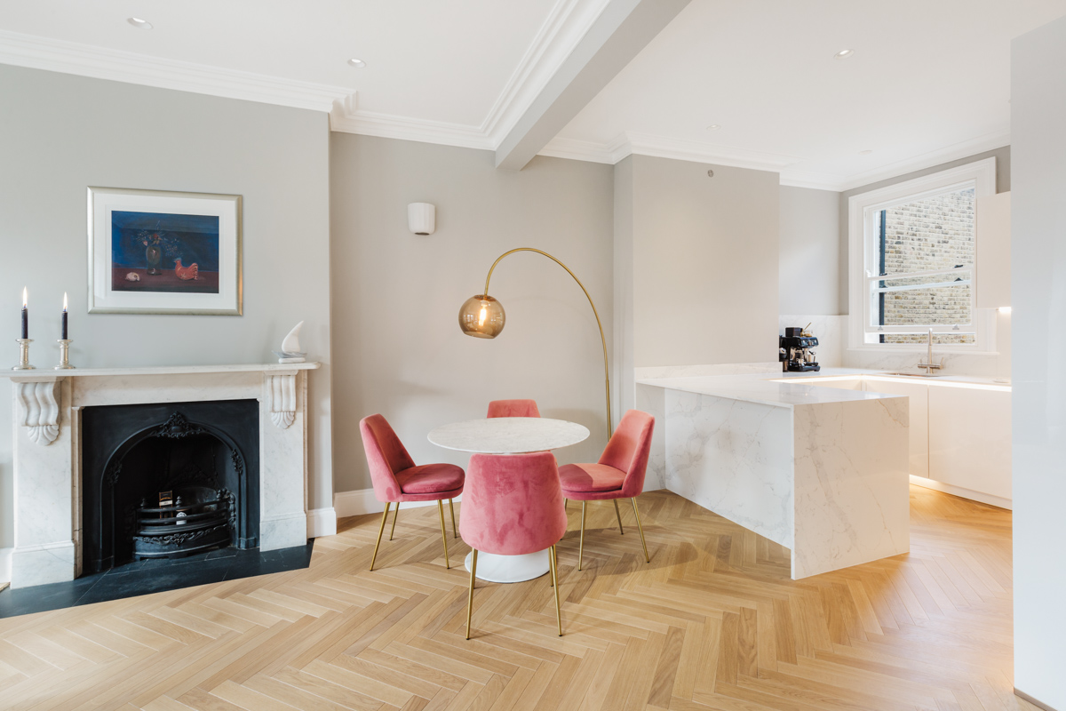 A sunlit open space kitchen with lounge in a house in Dulwich